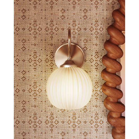 Vida Wall Sconce by Mitzi in patina brass. Made from unique in a unique style.