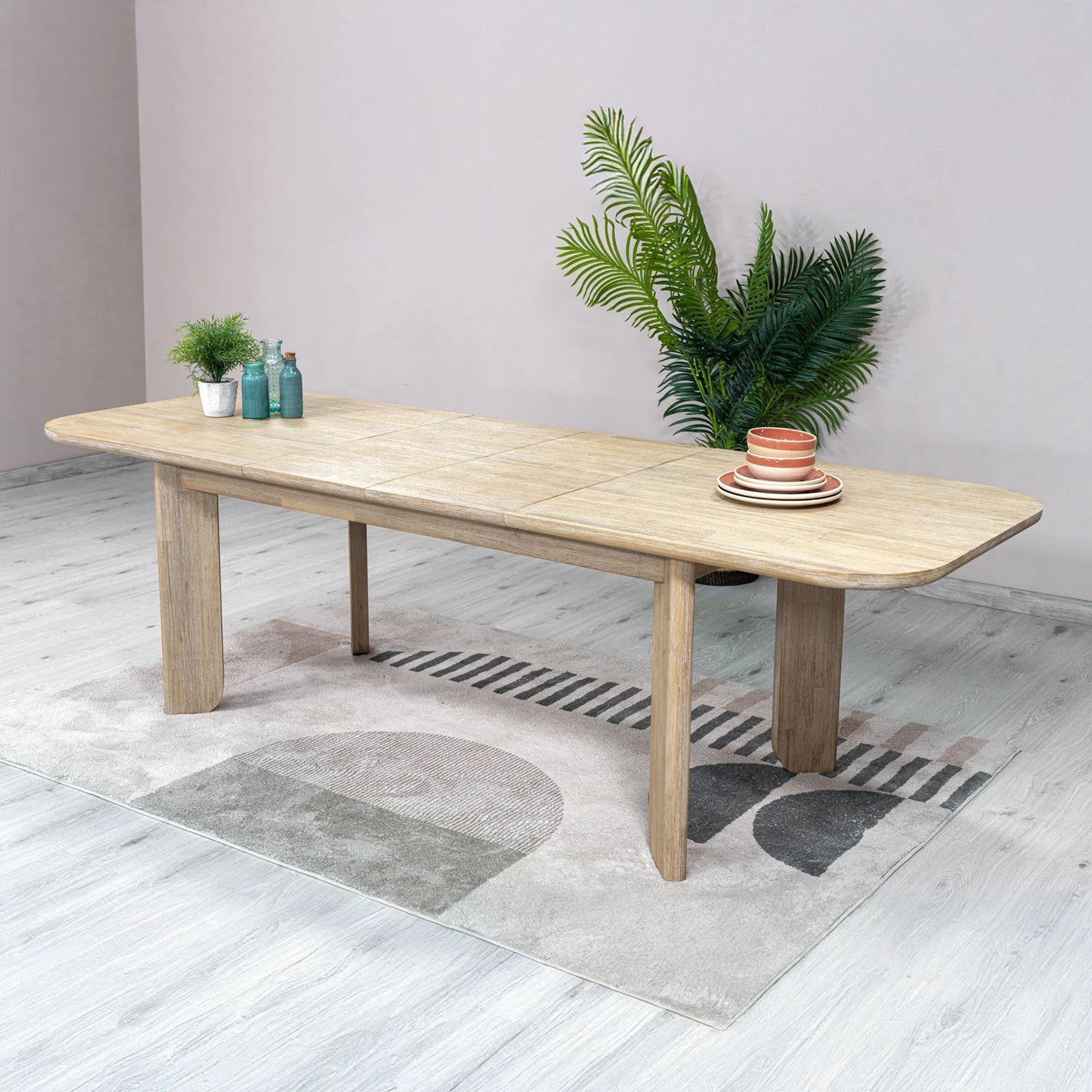 005 SI-2325068 | Unknown | Haru Extension Dining Table (70"/102") by LH Imports in beige and sand wash. Made from acacia in a unique style.