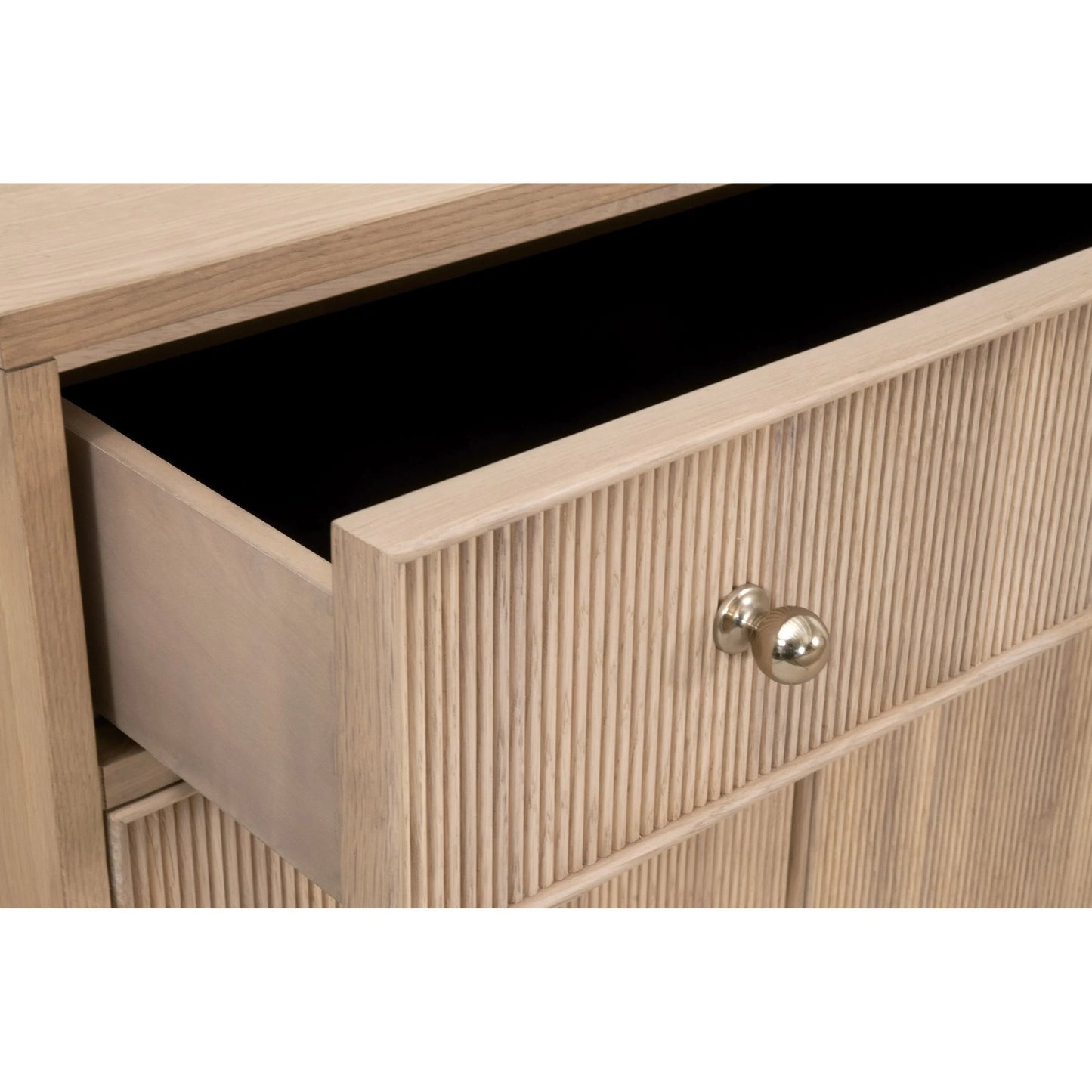 004 SI-2329415 | Closeup | Highland Media Sideboard by Essentials For Living in natural oak. Made from solid oak wood, oak veneer, iron, felt in a transitional style.