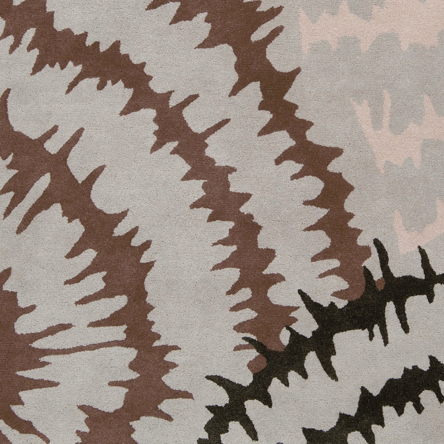 003 24217-12641 | Closeup | Harlequin Rug - 540 by Surya in light gray, charcoal, dark brown, light beige. Made from 100% new zealand wool in a unique style.