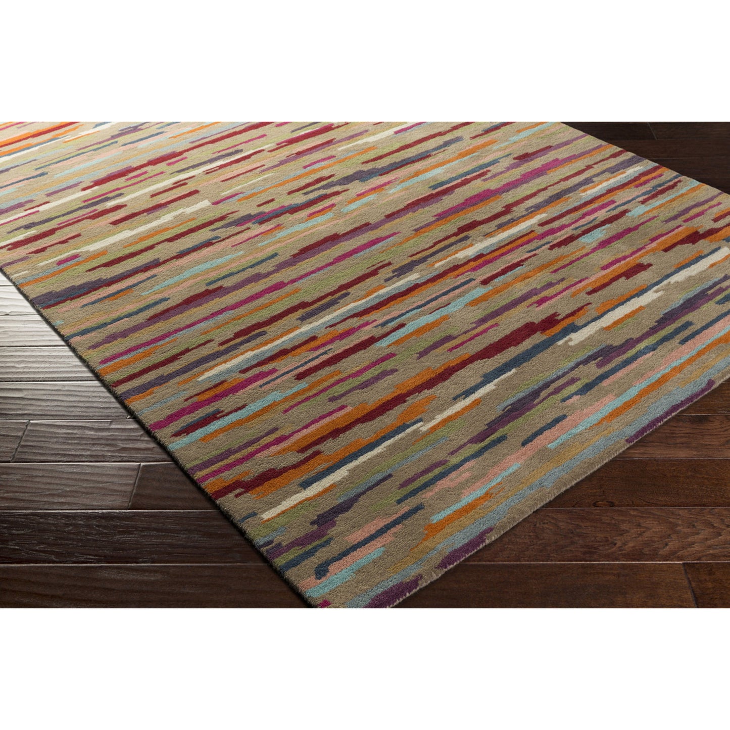 002 79317-12641 | Closeup | Harlequin Rug - 15630 by Surya in brown, red, rose, aqua, dark blue, burnt orange. Made from 100% new zealand wool in a unique style.