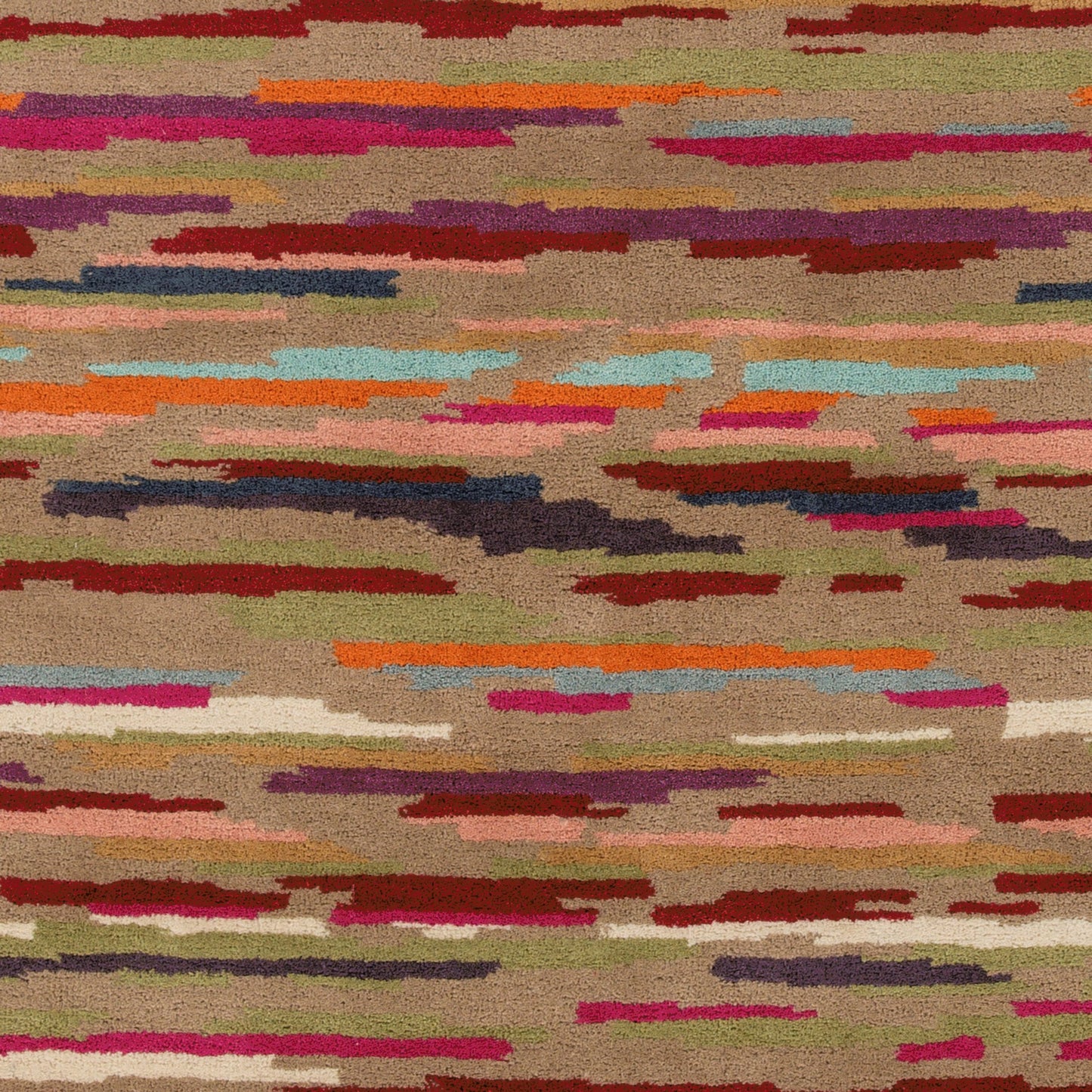 003 79317-12641 | Closeup | Harlequin Rug - 15630 by Surya in brown, red, rose, aqua, dark blue, burnt orange. Made from 100% new zealand wool in a unique style.