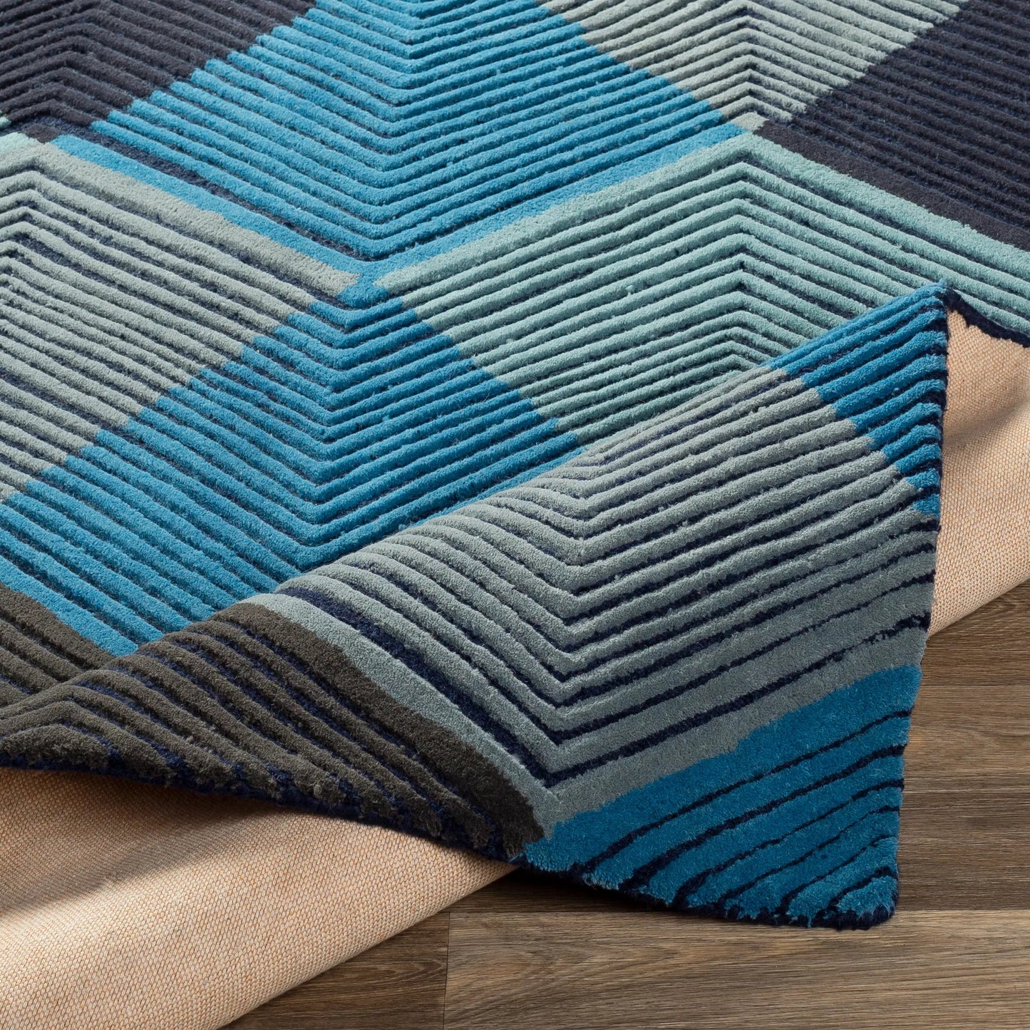 005 SI-1882339,SI-1882342 | Closeup | Harlequin Rug - 25103 by Surya in blue, slate, charcoal, black, pale blue, navy. Made from 100% wool in a unique style.