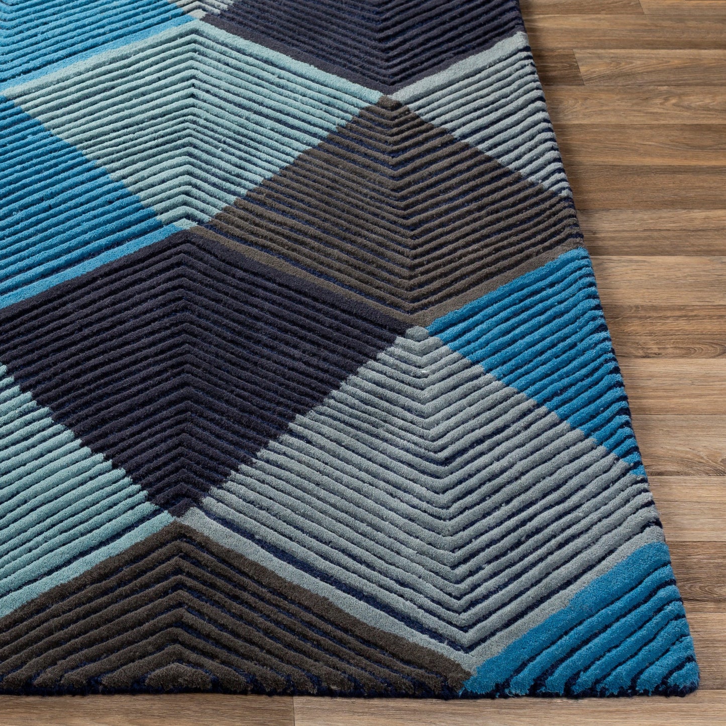 003 SI-1882339,SI-1882342 | Closeup | Harlequin Rug - 25103 by Surya in blue, slate, charcoal, black, pale blue, navy. Made from 100% wool in a unique style.