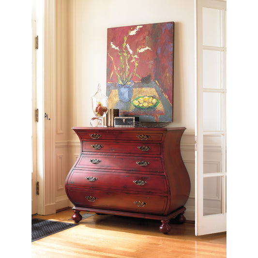 Bombe Chest by Hooker Furniture in red. Made from hardwood with veneers in a traditional style.