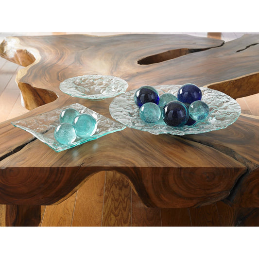 Bubble Plate by Phillips Collection in turquoise. Made from glass in a coastal style.