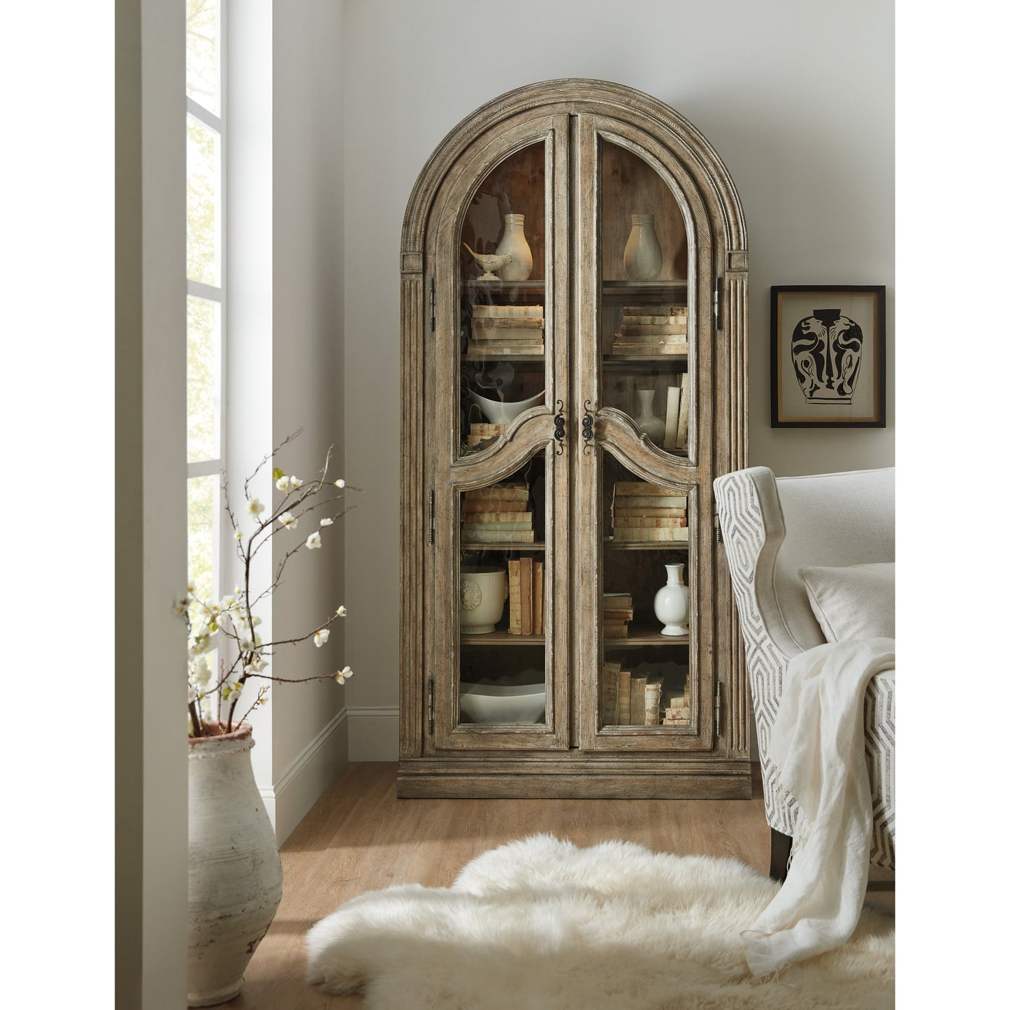 003 SI-1748570 | Lifestyle | Castella Bunching Curio Cabinet by Hooker Furniture in antique slate. Made from pecan, quartered walnut, quartered black walnut, quartered ash, maple veneers in a traditional style.