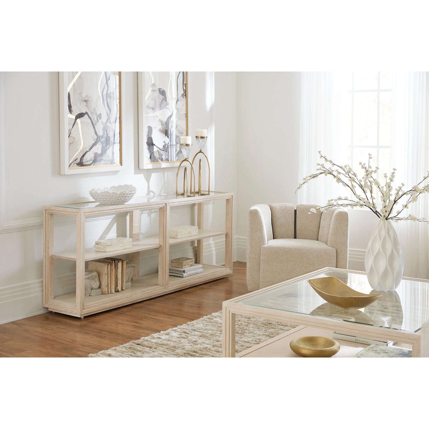 004 SI-2028943 | Lifestyle | Nouveau Chic Console Table by Hooker Furniture in sandstone. Made from oak veneers, tempered glass, metal in a modern style.