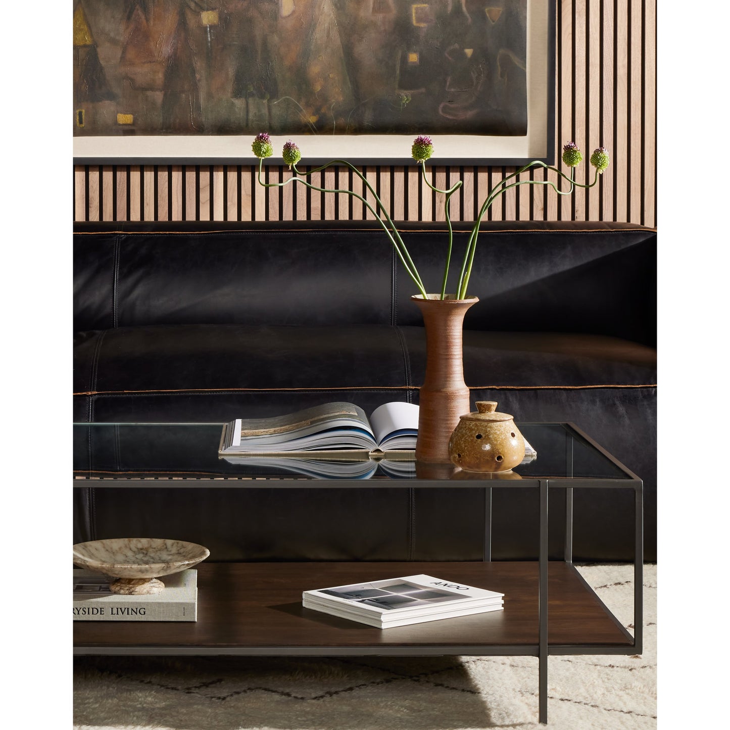 013 SR-368910 | Lifestyle | Byron Coffee Table by Four Hands in gunmetal, aged brown, tempered glass and dark iron, aged brown, tempered glass. Made from iron, solid mango, tempered glass in a modern style.
