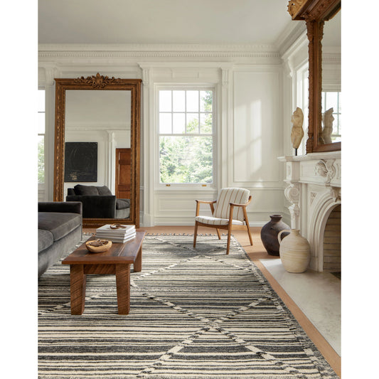 IMA-01 by Loloi in ivory, charcoal. Made from 100% wool in a rustic style.
