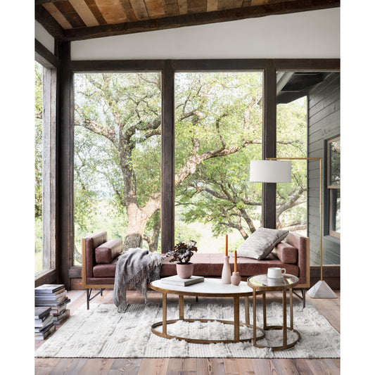 Calder Nesting Coffee Table by Four Hands in raw brass. Made from tempered glass, aluminum, engineered hardwood in a modern style.