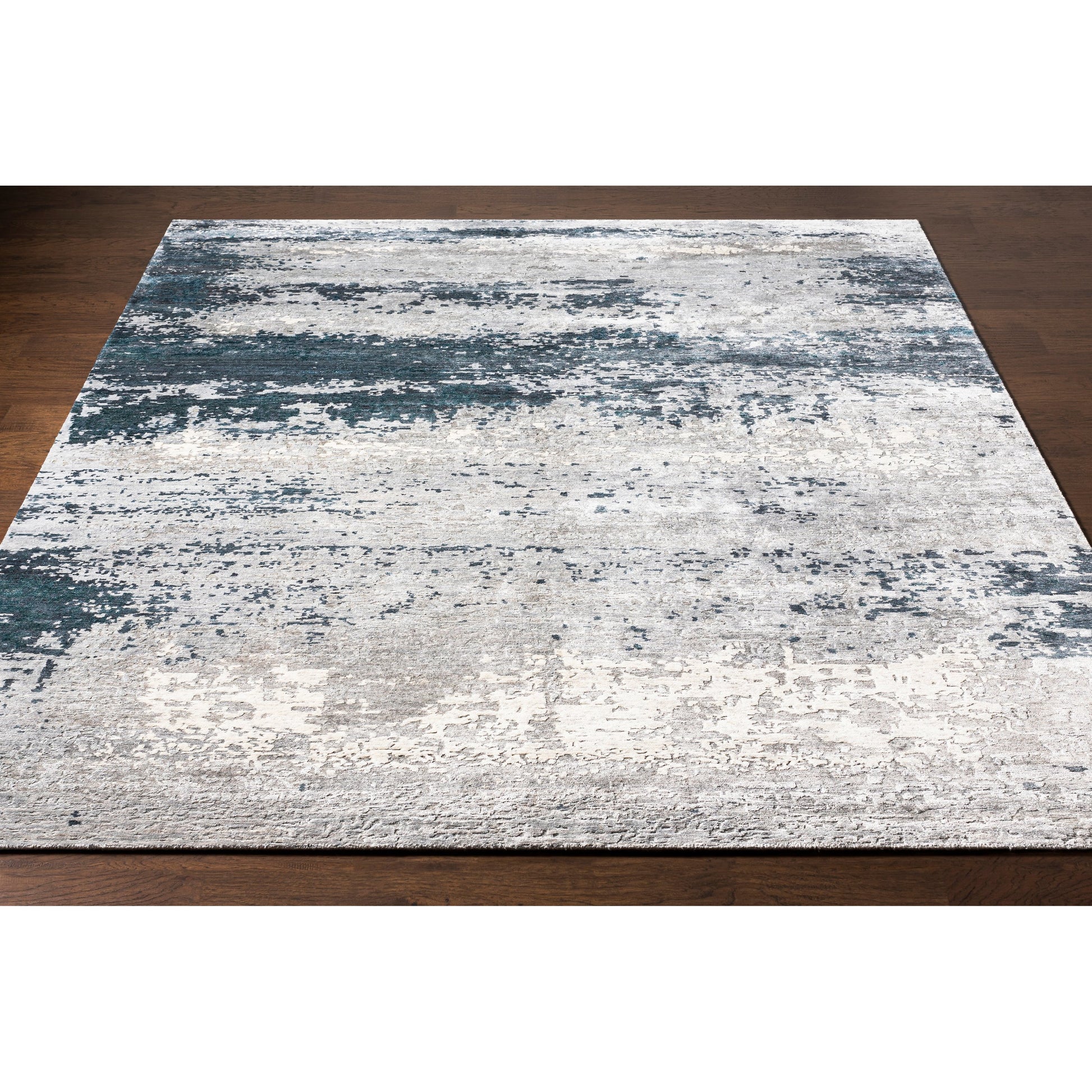 Imola Rug - 26077 by Surya in light beige, gray, light gray, dark blue, teal, charcoal. Made from 90% viscose, 10% nz wool in a unique style.