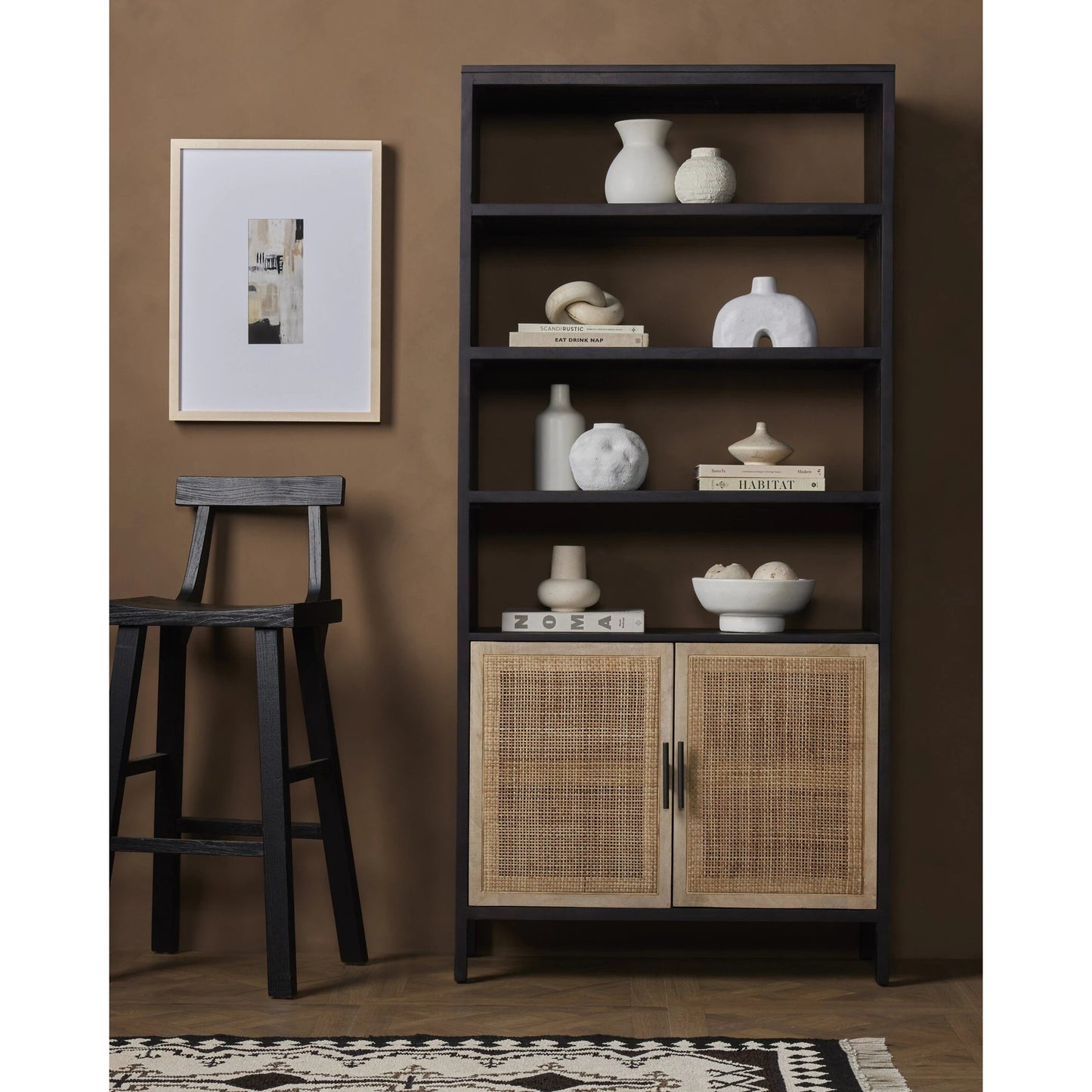 017 SR-368917 | Lifestyle | Caprice Bookshelf by Four Hands in washed black. Made from solid acacia in a modern style.