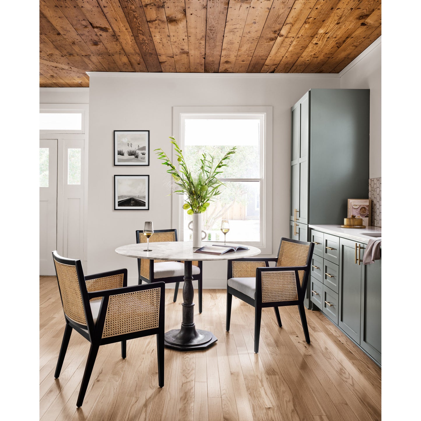 014 S-338927 | Lifestyle | Lucy Round Dining Table by Four Hands in carbon wash, white marble and carbon wash. Made from solid marble, iron, engineered hardwood in a traditional style.