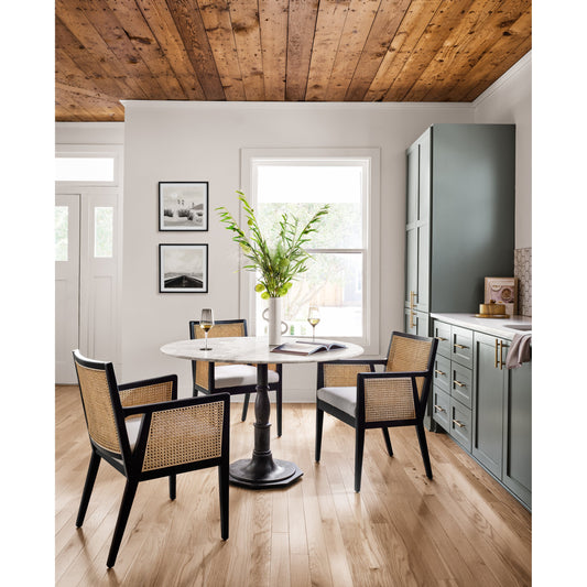 Lucy Round Dining Table by Four Hands in carbon wash, white marble and carbon wash. Made from solid marble, iron, engineered hardwood in a traditional style.