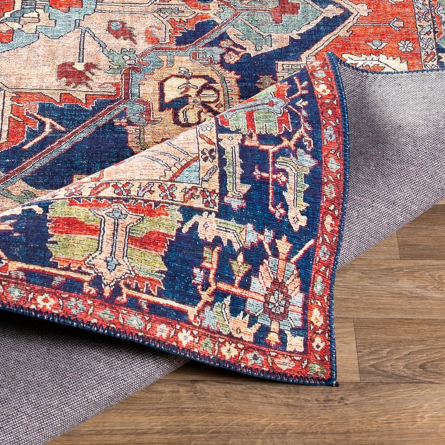 006 SI-1852790,SR-756250,SR-756251,SR-756252,SR-756253,SR-756254 | Additional Silo | Iris Rug by Livabliss in red, burnt orange, dark blue, ink blue, pale blue, green. Made from 100% polyester in a traditional style.