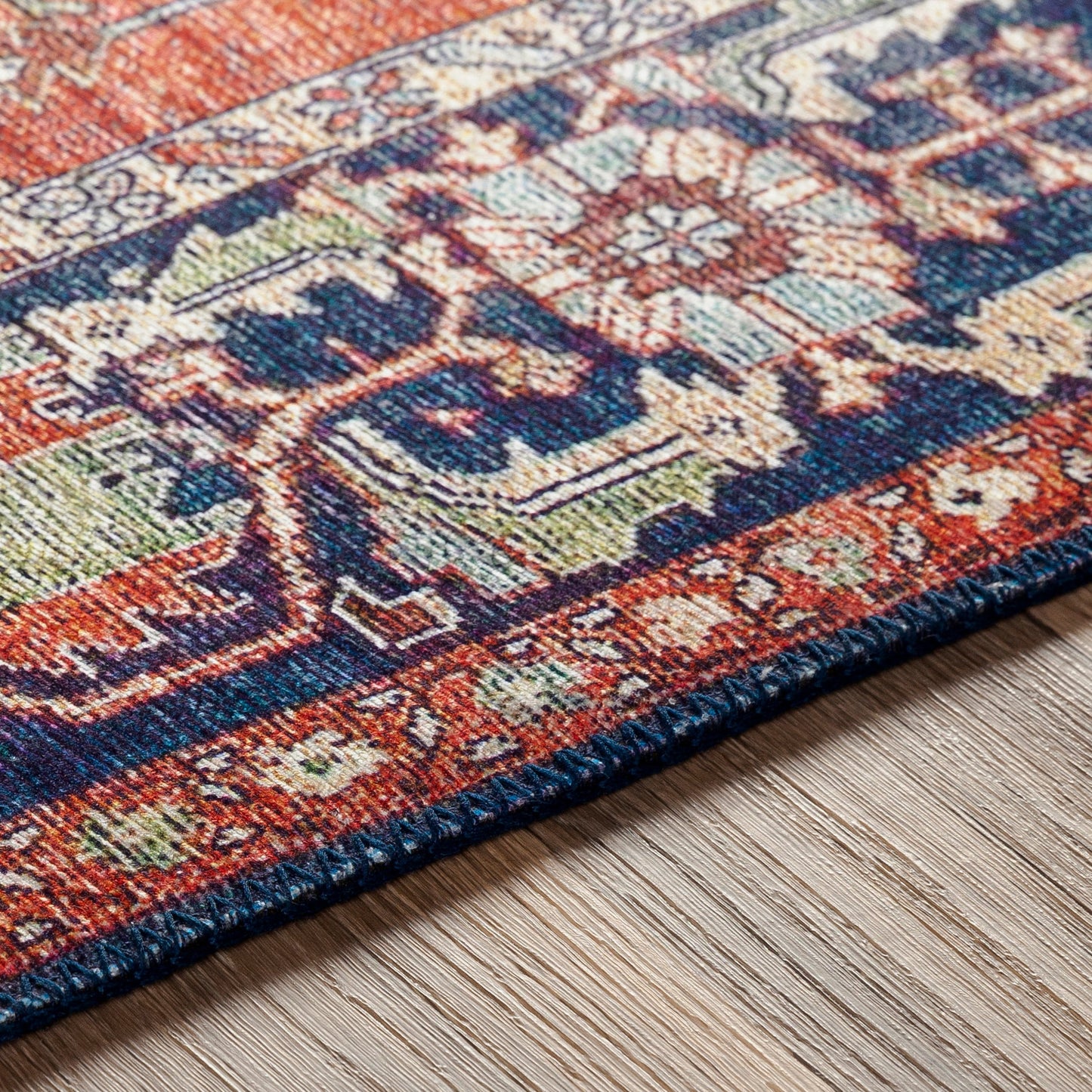 004 SI-1852790,SR-756250,SR-756251,SR-756252,SR-756253,SR-756254 | Additional Silo | Iris Rug by Livabliss in red, burnt orange, dark blue, ink blue, pale blue, green. Made from 100% polyester in a traditional style.