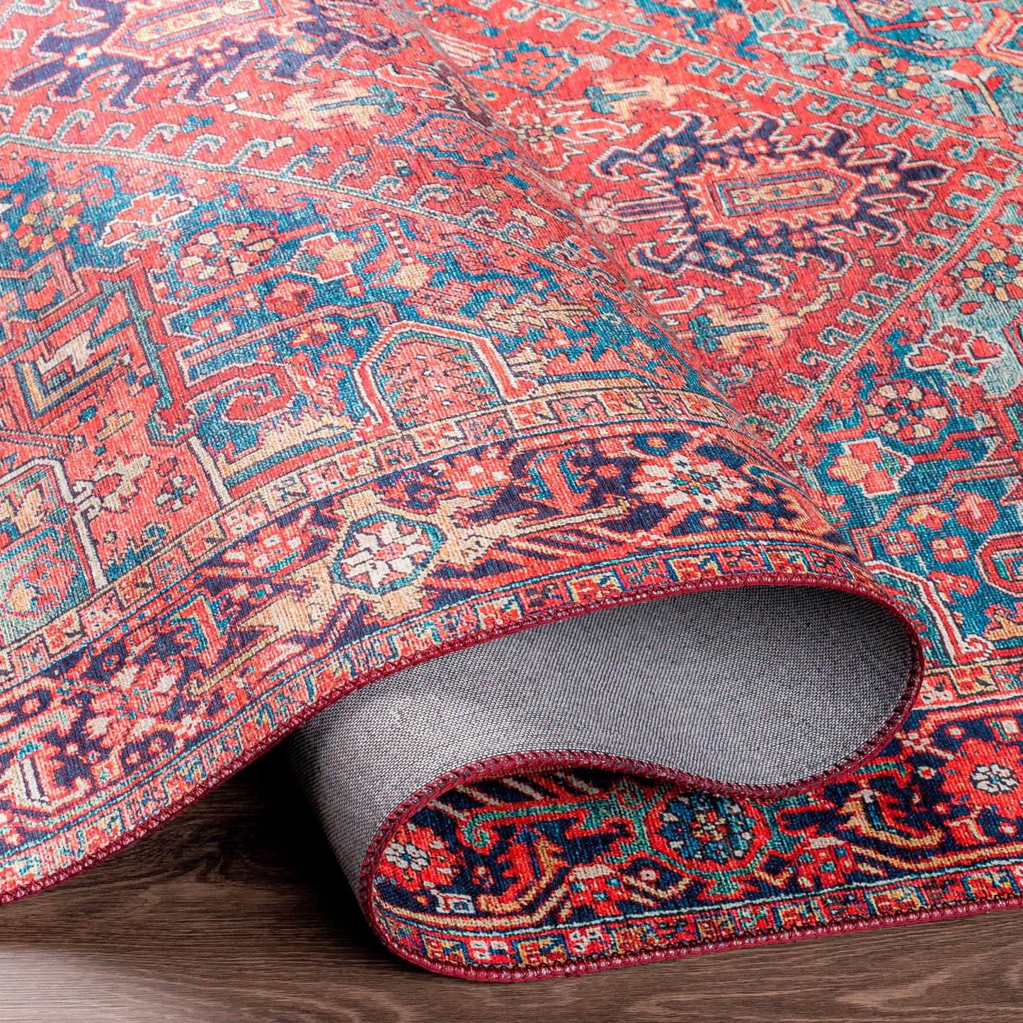 005 SI-1713844,SI-1713845,SI-1713846,SI-1713847,SI-1713848,SI-1713849 | Additional Silo | Iris Rug by Livabliss in dark blue, red, tan, teal, cream. Made from 100% polyester in a traditional style.