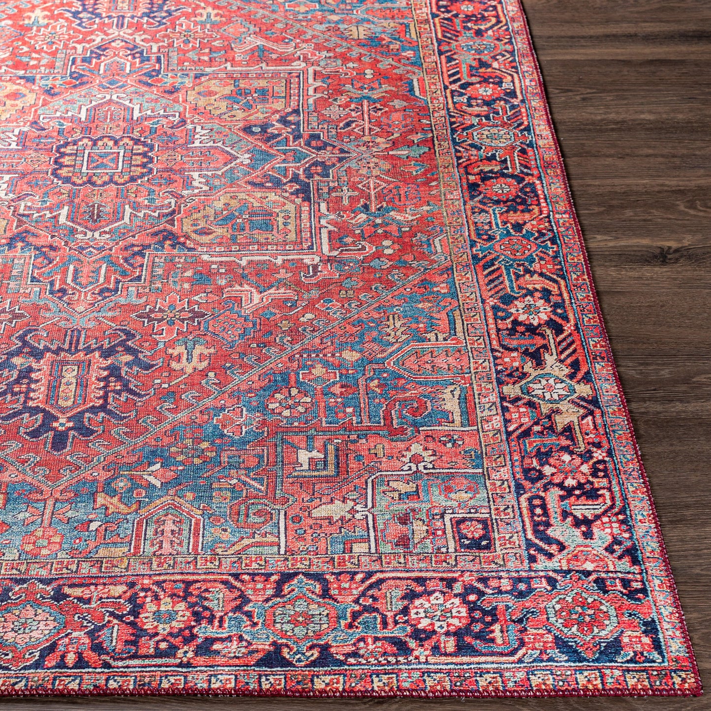 004 SI-1713844,SI-1713845,SI-1713846,SI-1713847,SI-1713848,SI-1713849 | Additional Silo | Iris Rug by Livabliss in dark blue, red, tan, teal, cream. Made from 100% polyester in a traditional style.