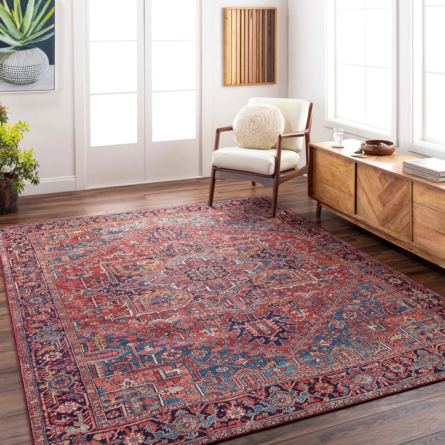 011 SI-1713844,SI-1713845,SI-1713846,SI-1713847,SI-1713848,SI-1713849 | Lifestyle | Iris Rug by Livabliss in dark blue, red, tan, teal, cream. Made from 100% polyester in a traditional style.