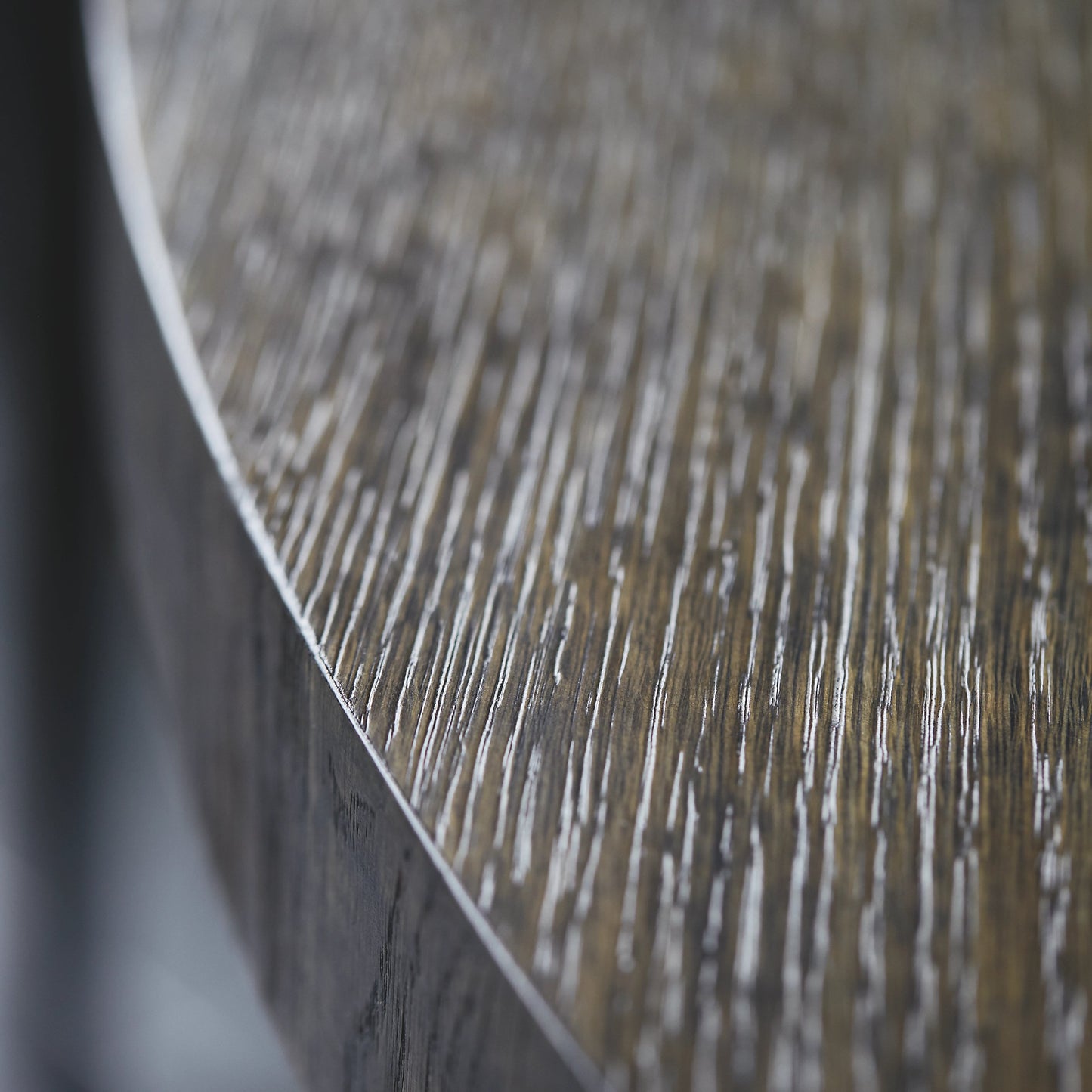 003 SI-1711408 | Additional Silo | Linea Round Dining Table by Bernhardt in cerused charcoal, textured graphite metal. Made from white oak veneers, cast aluminum in a unique style.