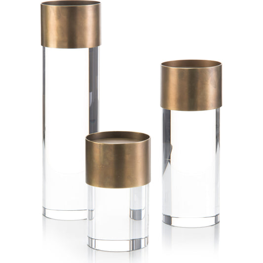 Crystal and Antique Brass Candleholders by John-Richard in brass and gold, clear. Made from brass, crystal in a eclectic & global style.