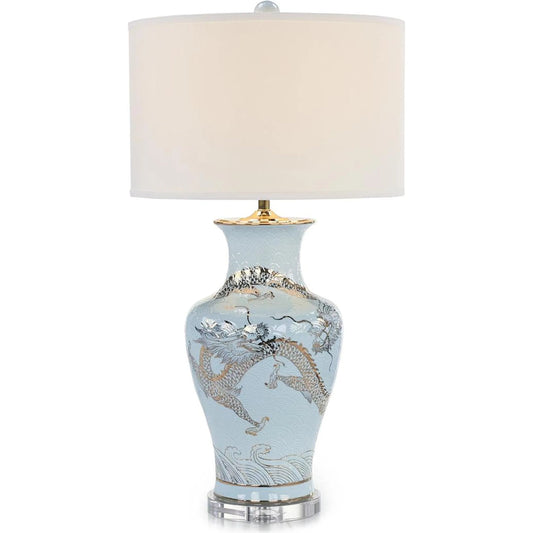 Dueling Dragons Table Lamp by John-Richard in blue, gold, white and polished brass, glazed. Made from porcelain, crystal, linen, brass in a traditional style.