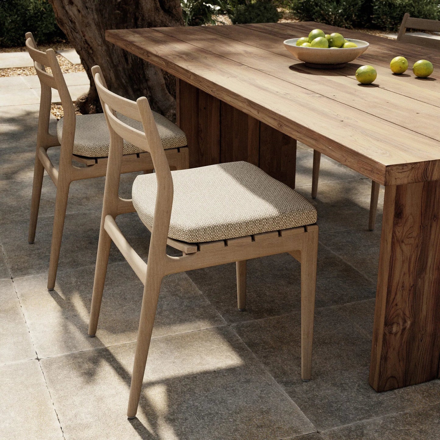 092 SI-1797897 | Lifestyle | Atherton Outdoor Dining Chair by Four Hands. Made from 100% olefin, solid fsc®-certified teak, 91% polyurethane foam pad, 9% polyester fiber batting in a coastal style.