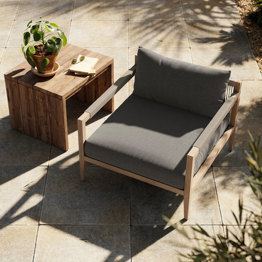 Sherwood Outdoor Chair, Washed Brown by Four Hands. Made from 100% olefin, solid fsc®-certified teak, 100% polypropylene in a coastal style.