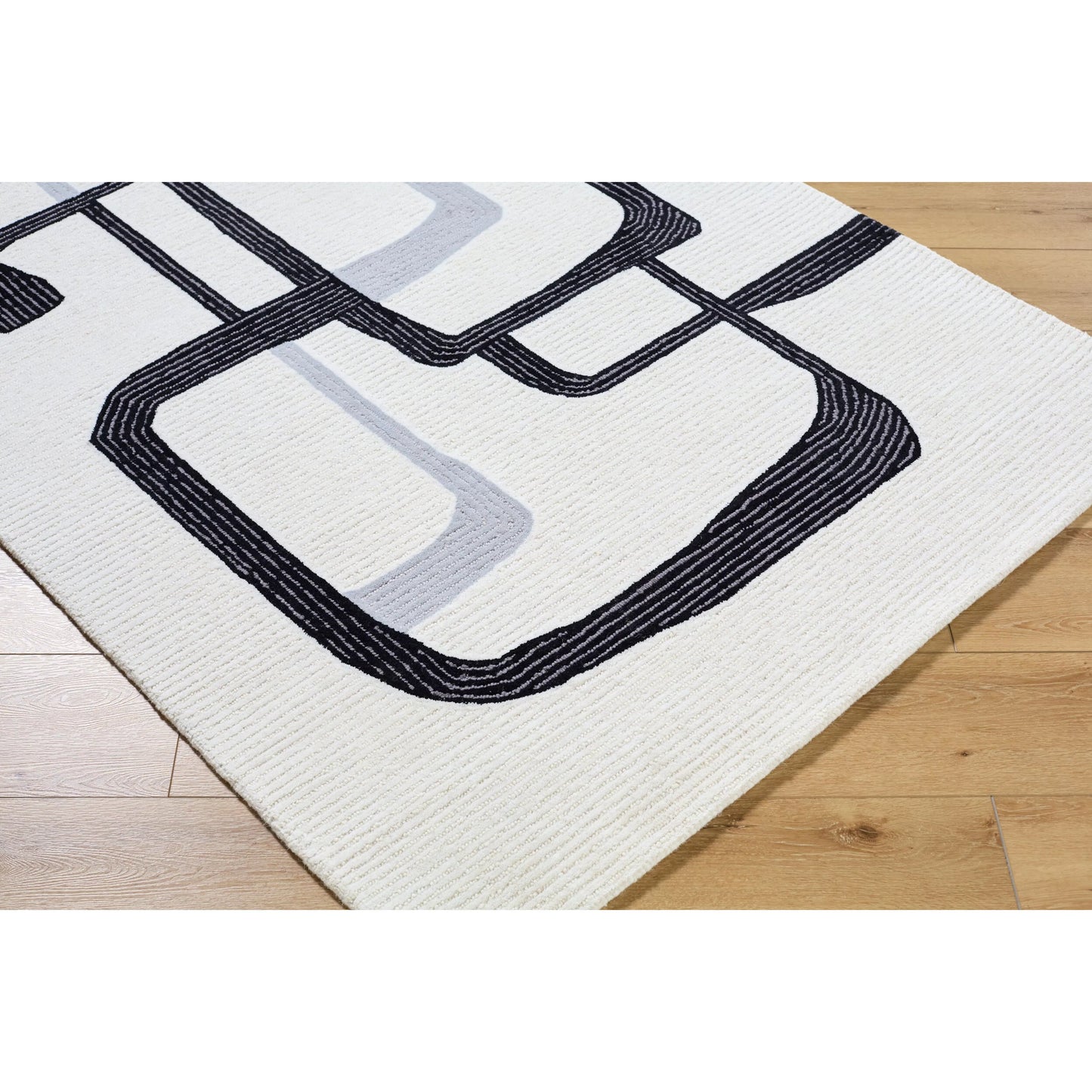 002 SI-2164838,SI-2164839,SI-2164840,SI-2164841 | Closeup | Rossi Rug - 532291 by Livabliss in ash, jet black. Made from wool in a unique style.