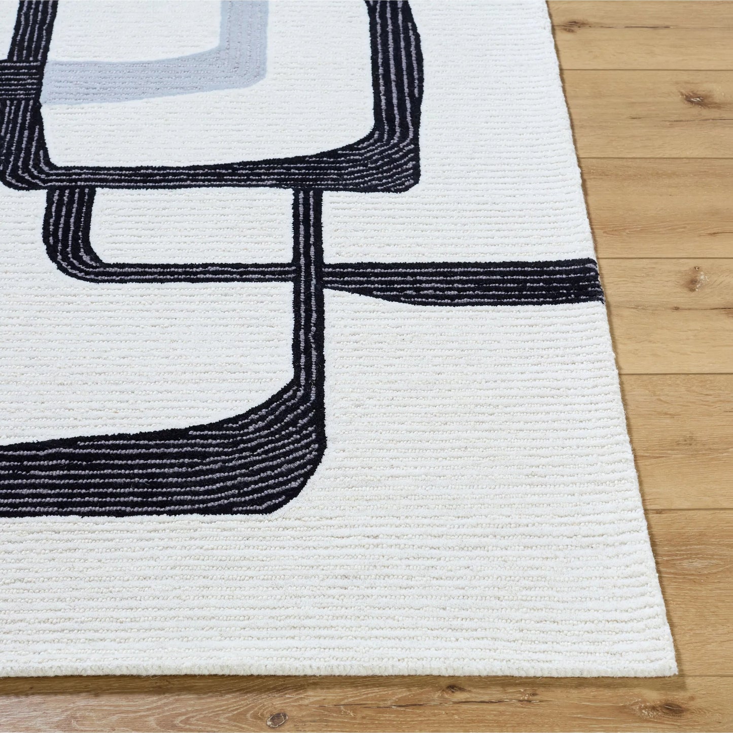 003 SI-2164838,SI-2164839,SI-2164840,SI-2164841 | Closeup | Rossi Rug - 532291 by Livabliss in ash, jet black. Made from wool in a unique style.