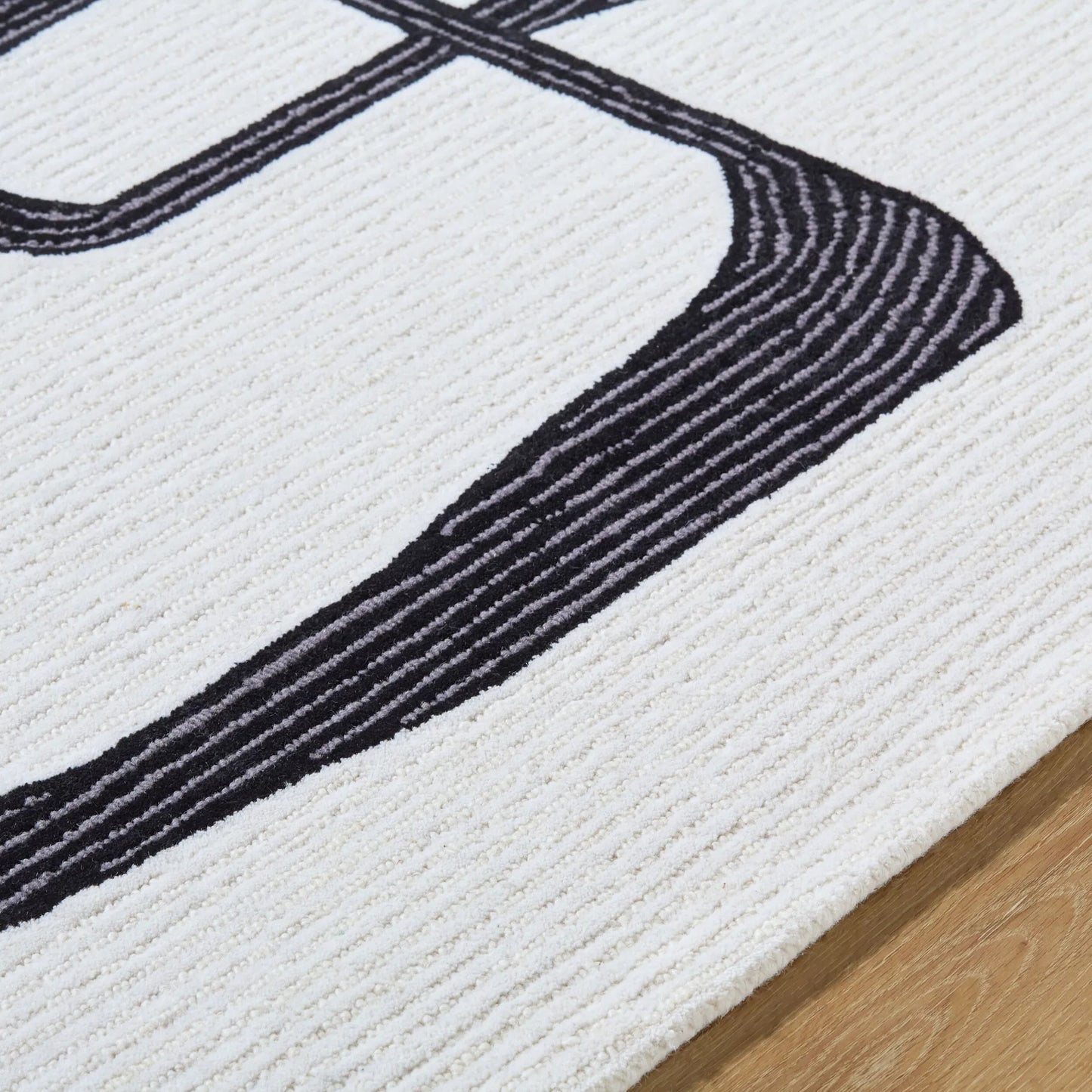005 SI-2164838,SI-2164839,SI-2164840,SI-2164841 | Closeup | Rossi Rug - 532291 by Livabliss in ash, jet black. Made from wool in a unique style.
