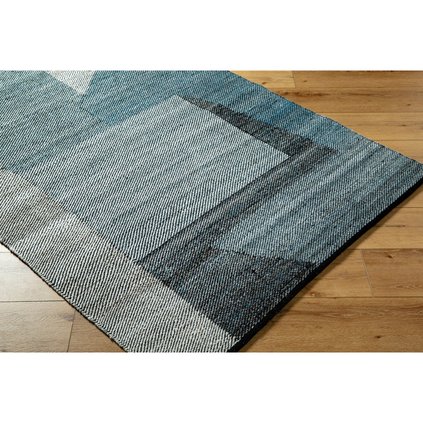 002 SI-2167495,SI-2167496,SI-2167497,SI-2167498 | Closeup | Jocelyn Rug - 484364 by Livabliss in grey, metallic - silver, slate blue, nickel, charcoal. Made from recycled pet yarn in a unique style.