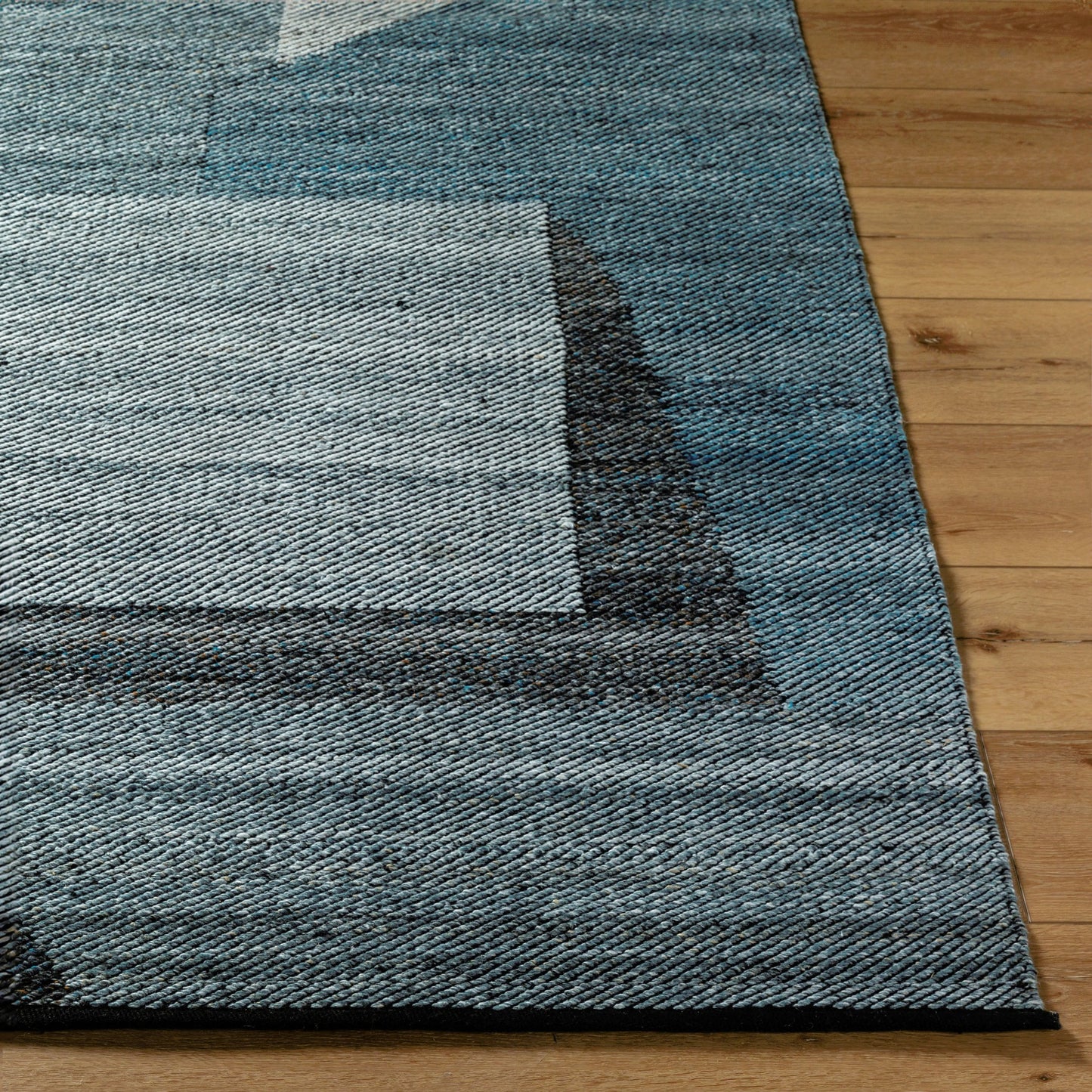 003 SI-2167495,SI-2167496,SI-2167497,SI-2167498 | Closeup | Jocelyn Rug - 484364 by Livabliss in grey, metallic - silver, slate blue, nickel, charcoal. Made from recycled pet yarn in a unique style.