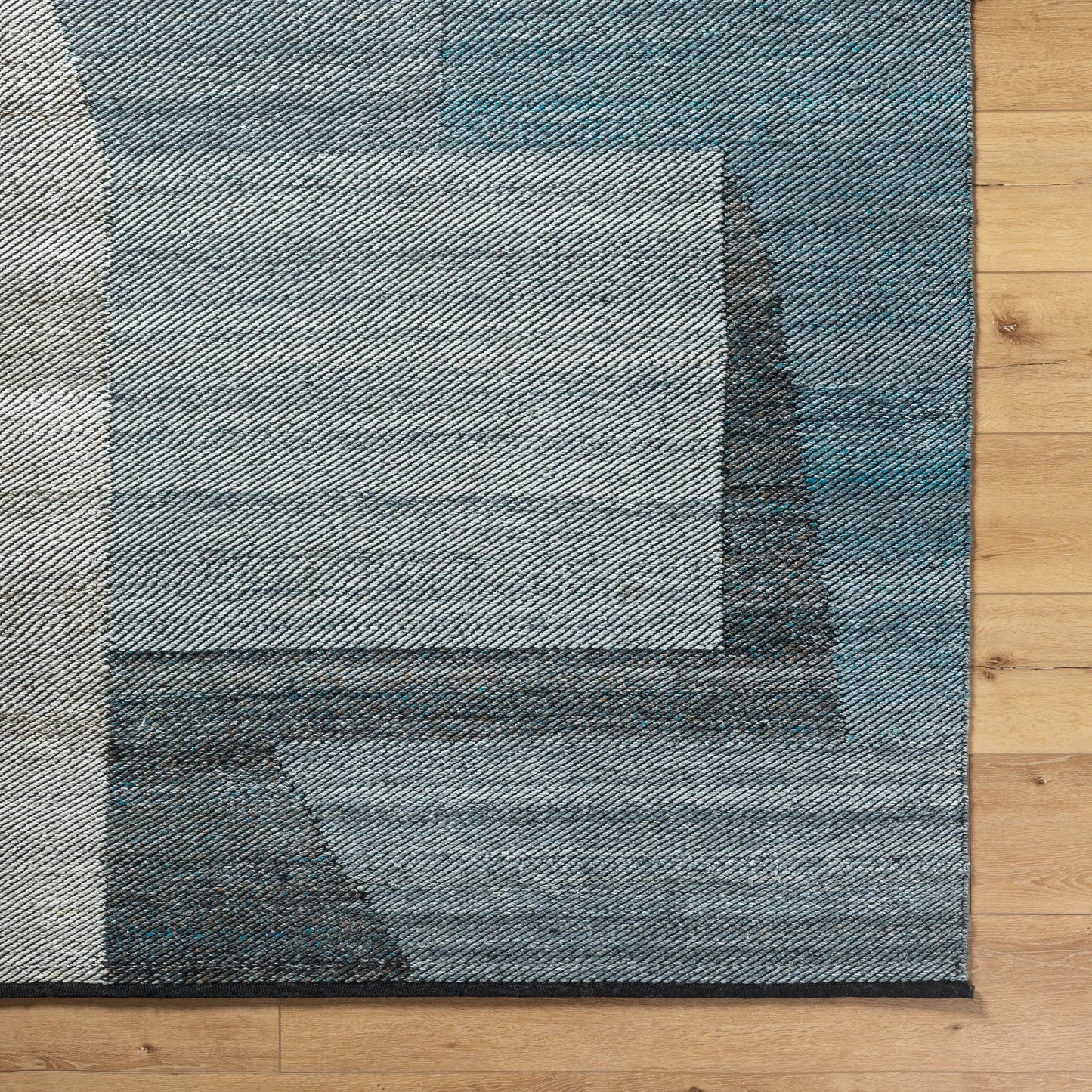 006 SI-2167495,SI-2167496,SI-2167497,SI-2167498 | Closeup | Jocelyn Rug - 484364 by Livabliss in grey, metallic - silver, slate blue, nickel, charcoal. Made from recycled pet yarn in a unique style.