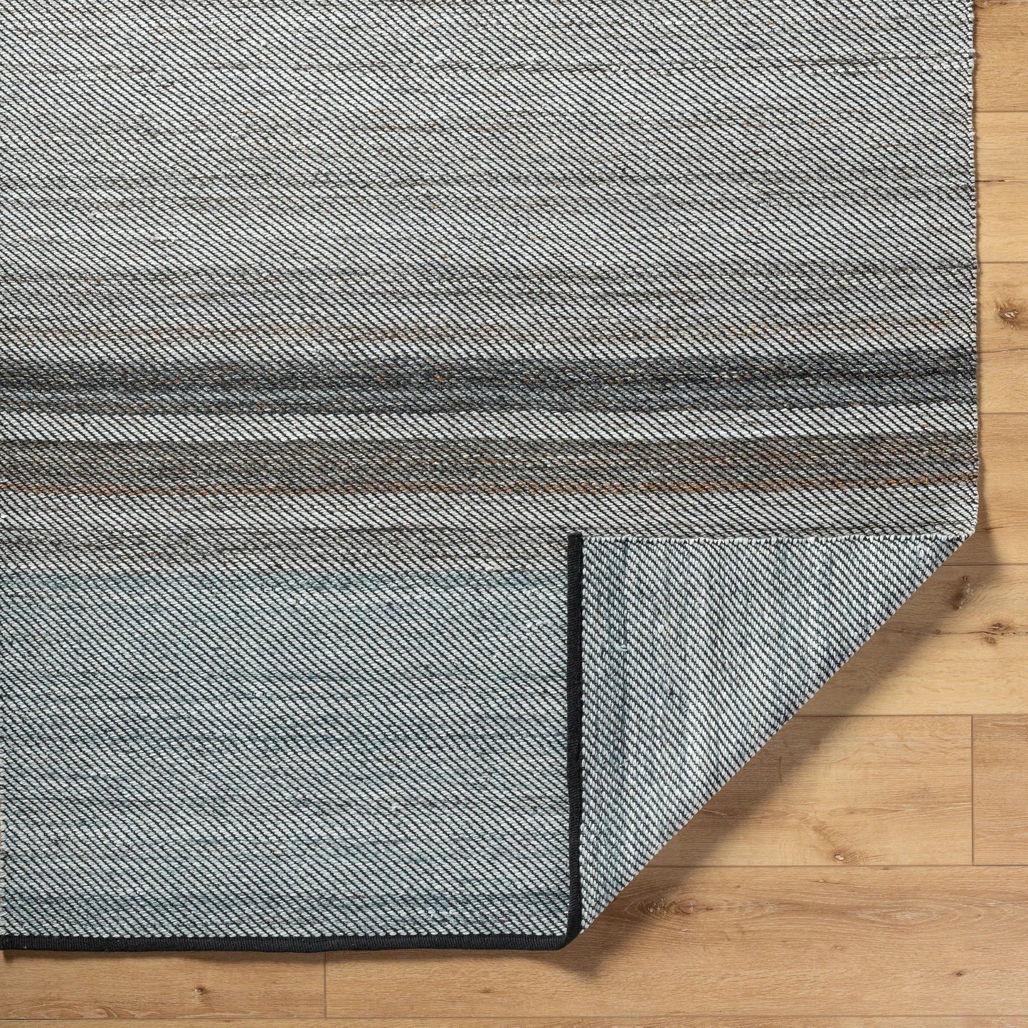004 SI-2167499,SI-2167500,SI-2167501,SI-2167502 | Closeup | Jocelyn Rug - 484373 by Livabliss in grey, metallic - silver, slate, sage, charcoal. Made from recycled pet yarn in a unique style.