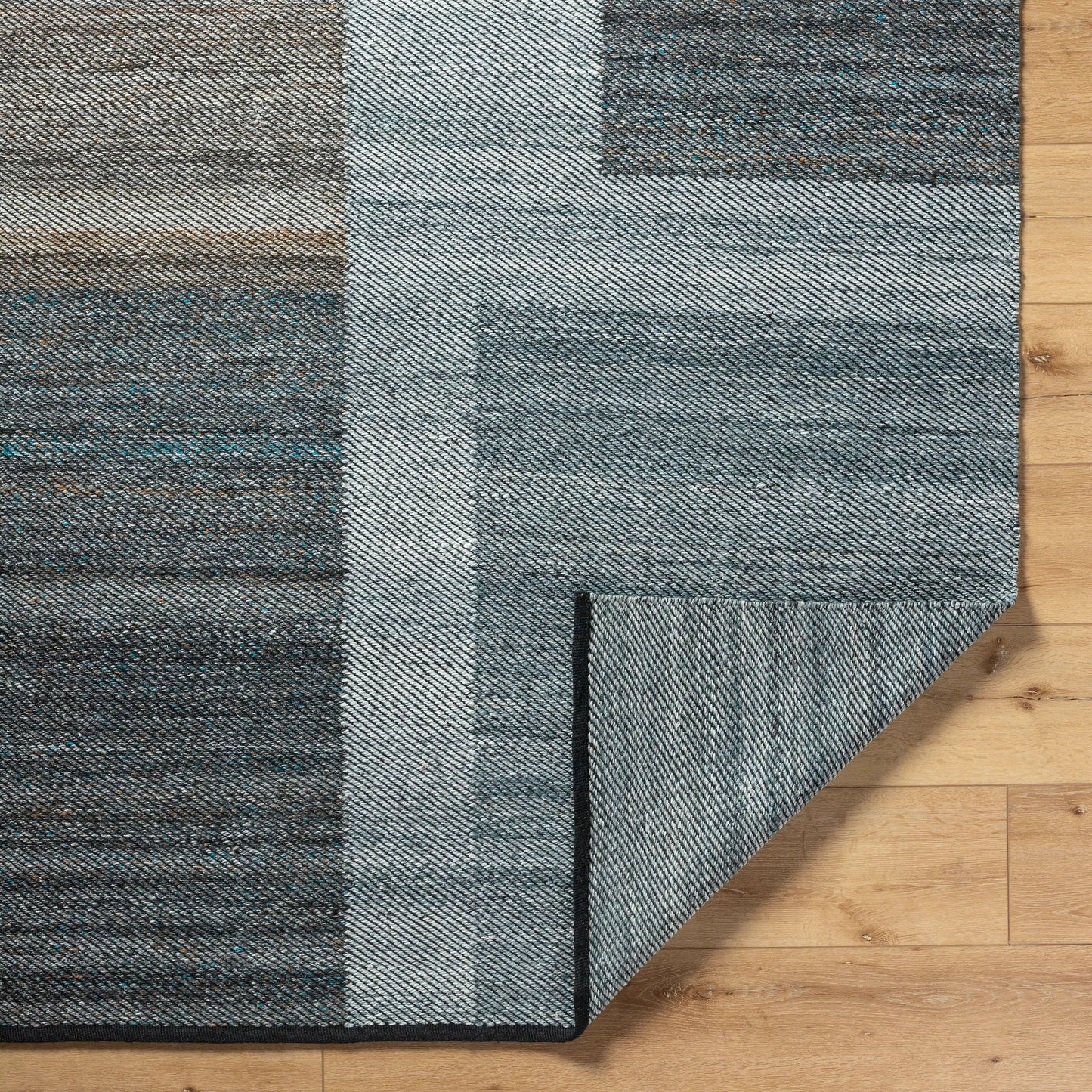 004 SI-2167503,SI-2167504,SI-2167505,SI-2167506 | Closeup | Jocelyn Rug - 484382 by Livabliss in grey, medium grey, dark grey, metallic - silver, sage. Made from recycled pet yarn in a unique style.