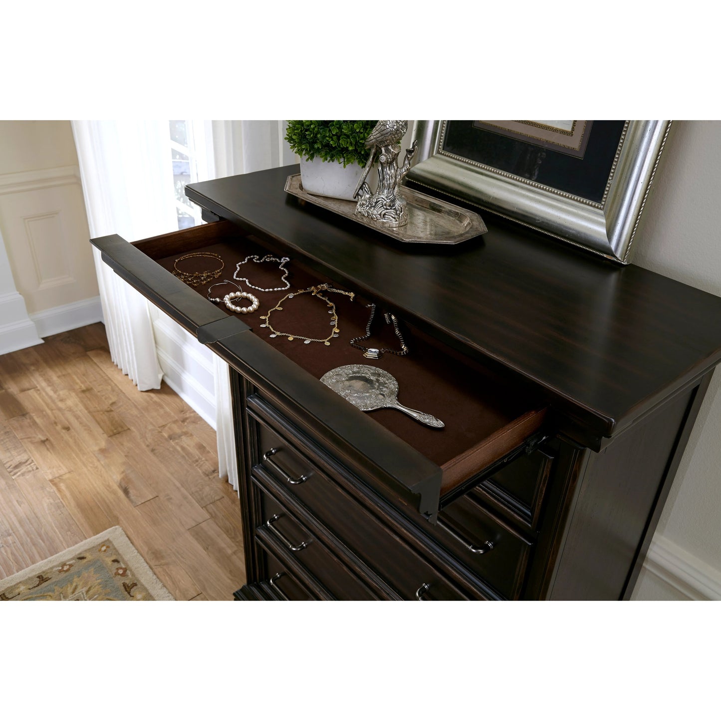 003 SI-2155449 | Closeup | Caldwell-Drawer Chest by Pulaski Furniture in deep brown. Made from acacia veneers, asian hardwood in a traditional style.