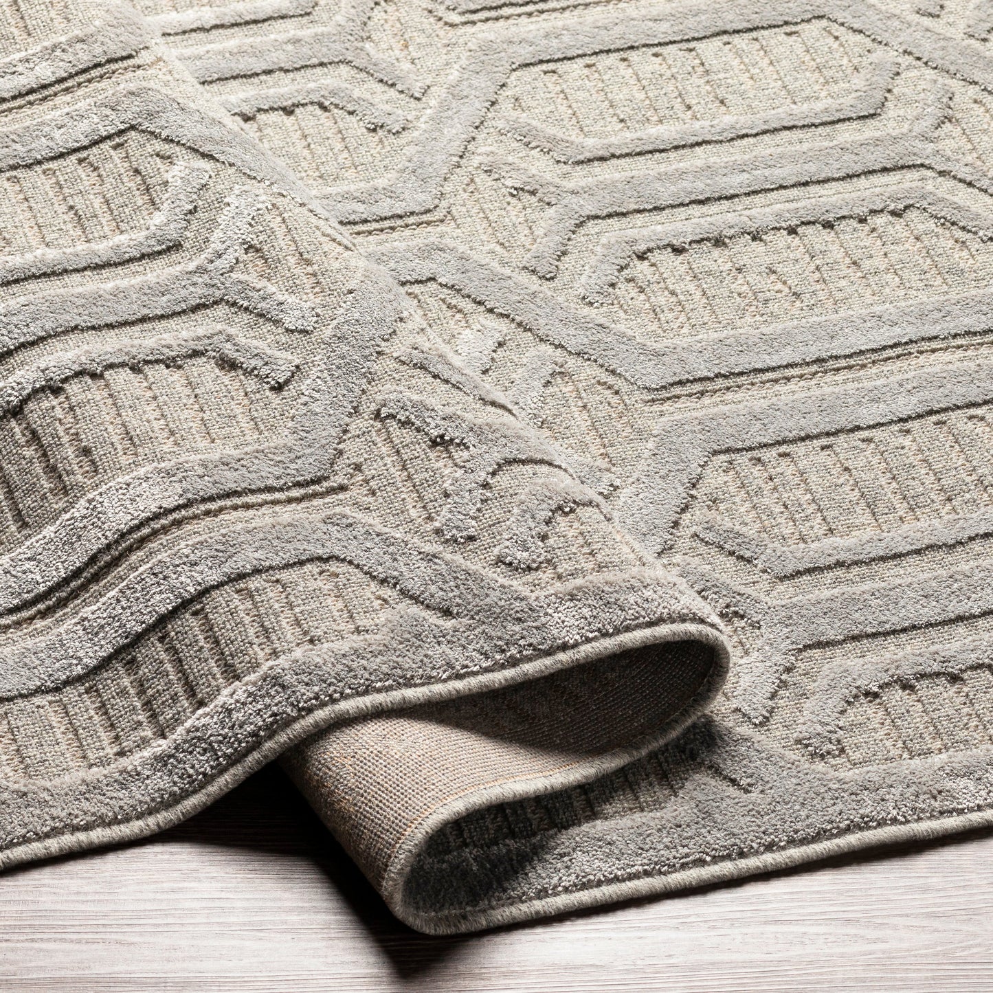 005 SI-1884275,SI-1884279 | Closeup | Kingston Rug - 29826 by Livabliss in gray, medium gray. Made from 51% viscose, 49% wool in a unique style.