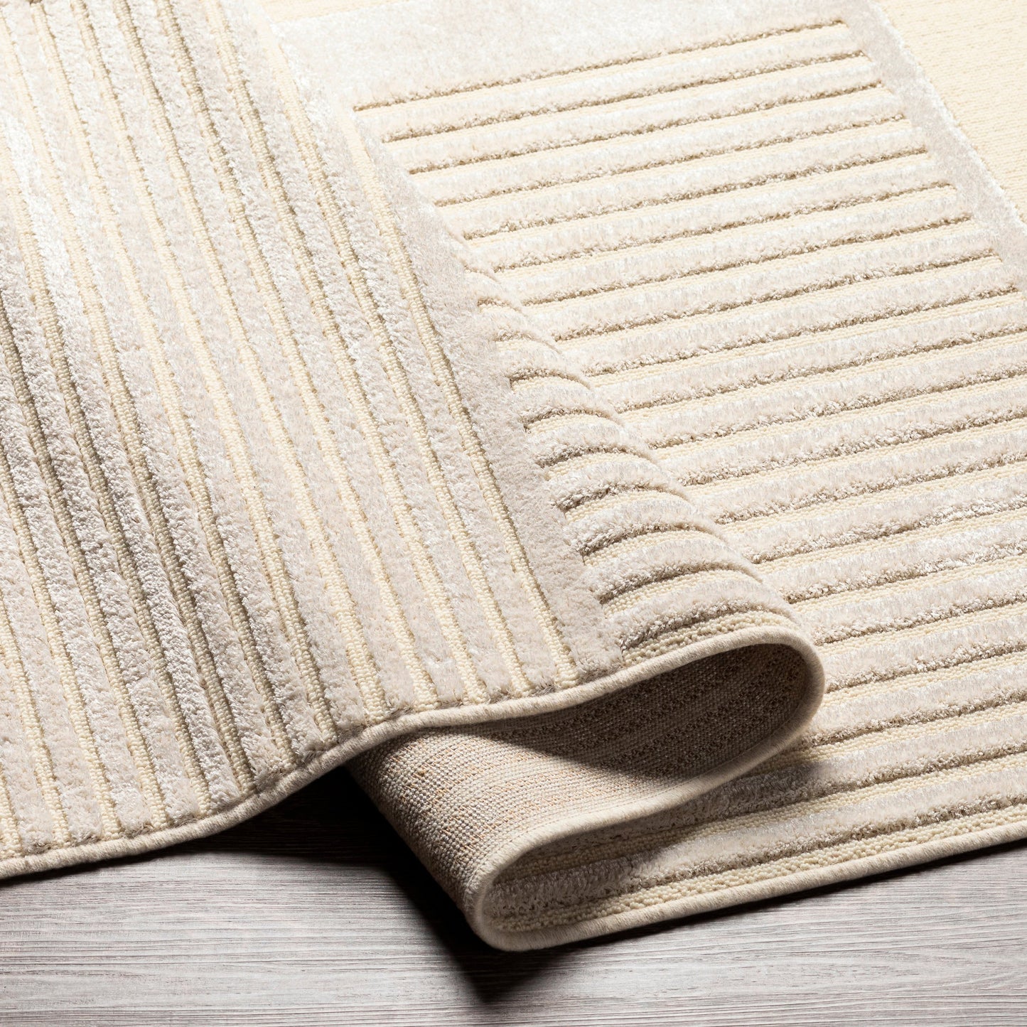 005 SI-1884296 | Closeup | Kingston Rug - 29828 by Livabliss in cream, light beige. Made from 51% viscose, 49% wool in a unique style.