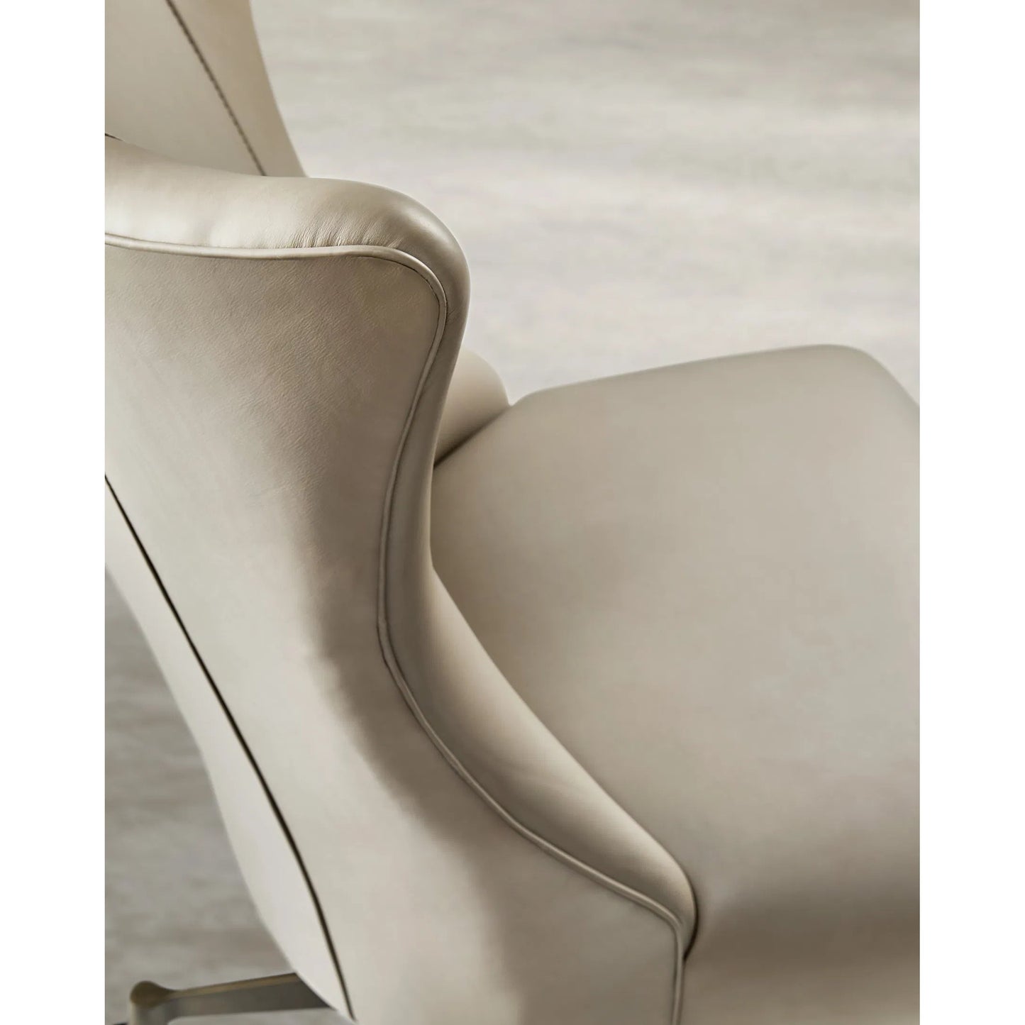 003 SI-2354035 | Closeup | Lynn Executive Swivel Tilt Chair by Hooker Furniture in apollo mineral. Made from leather in a unique style.