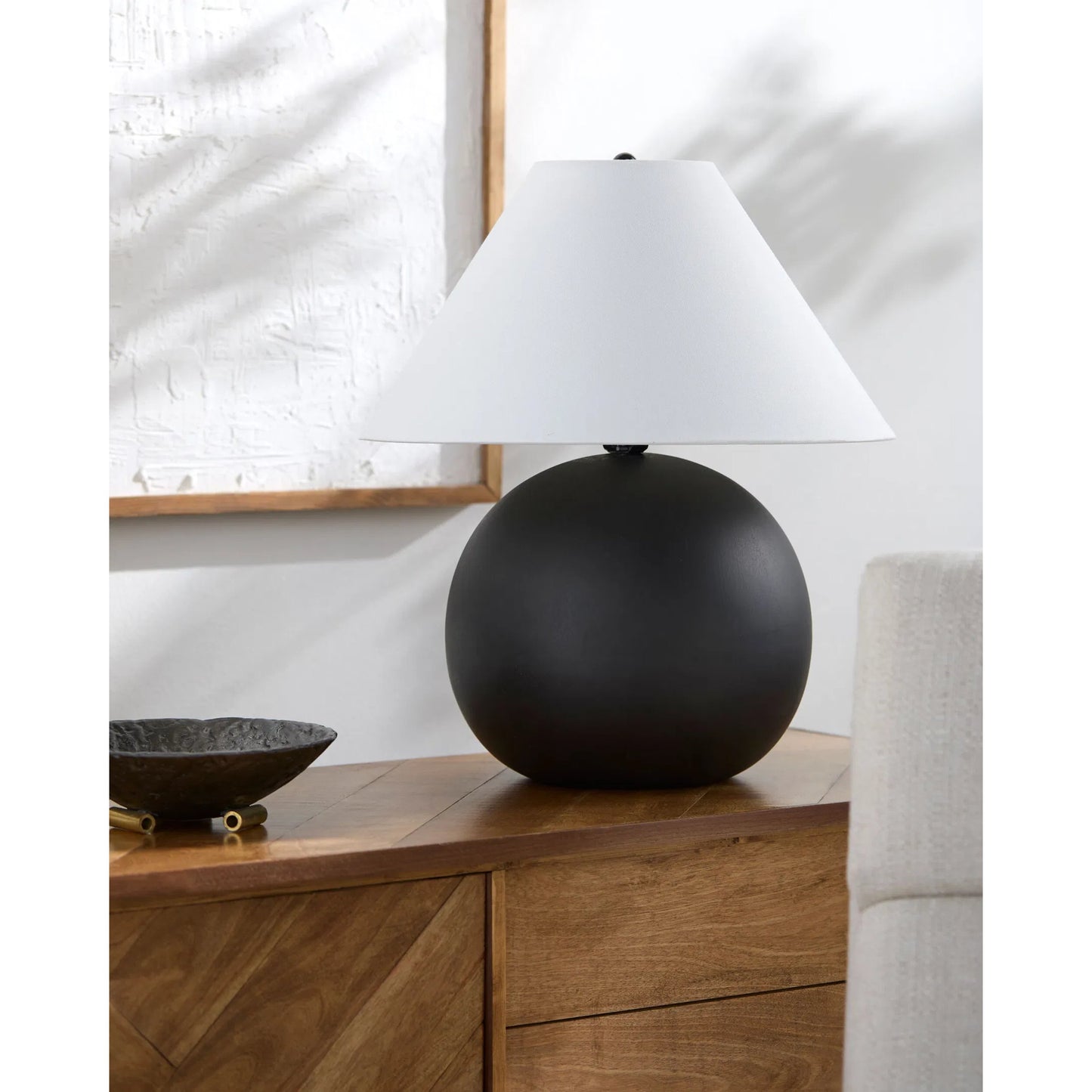 002 SI-2349568 | Lifestyle | Kogel Accent Table Lamp by Livabliss in body: black; shade: white; finial: black; harp: black; cord: translucent and hand finished. Made from ceramic, linen, polystyrene, iron in a modern style.