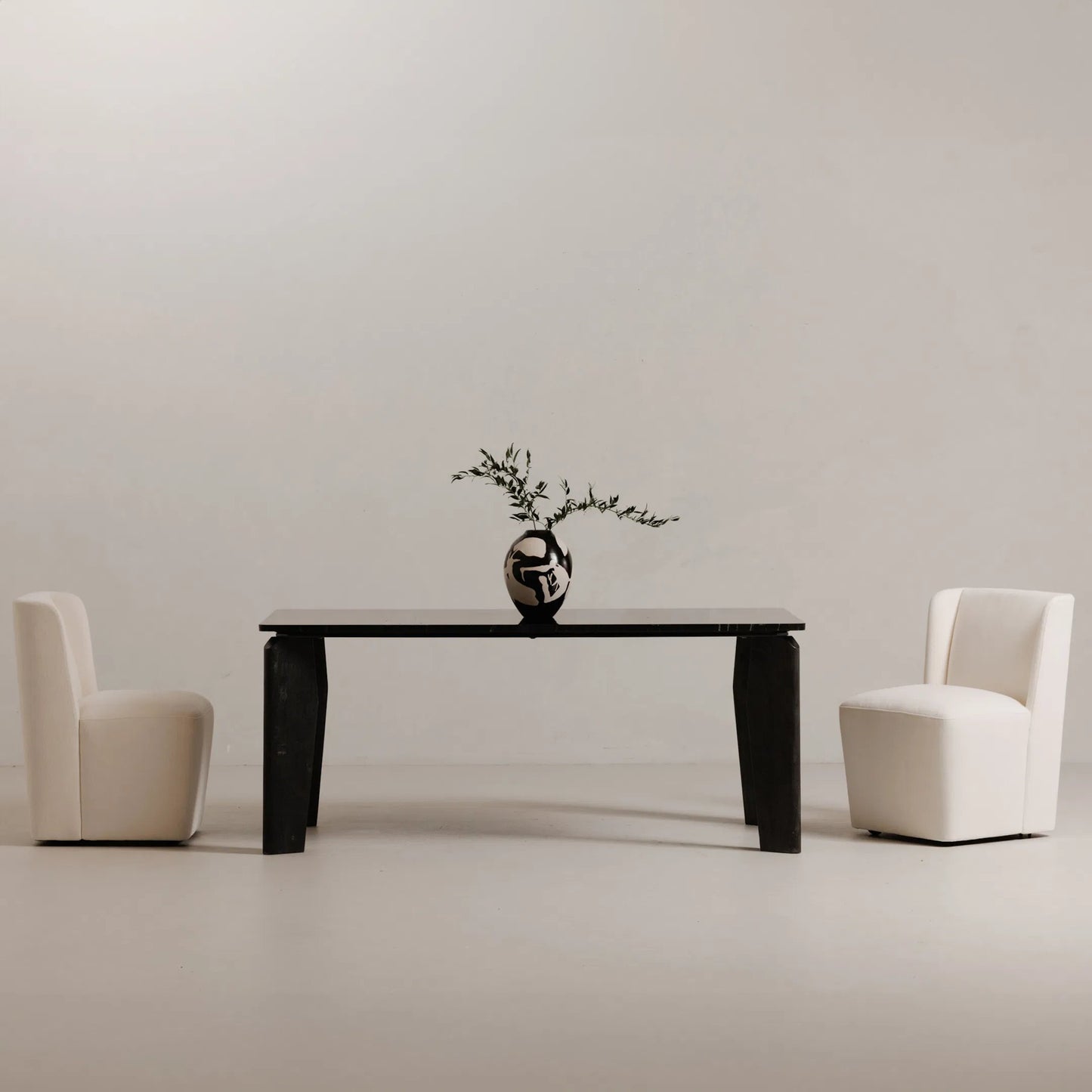 003 SI-2253656 | Lifestyle | Cormac Rolling Dining Chair Performance Fabric by Moe's Home Collection. Made from upholstery: 100% polyester, poplar multi, layer board, laminated veneer lumber, high density foam, metal wheels in a transitional style.
