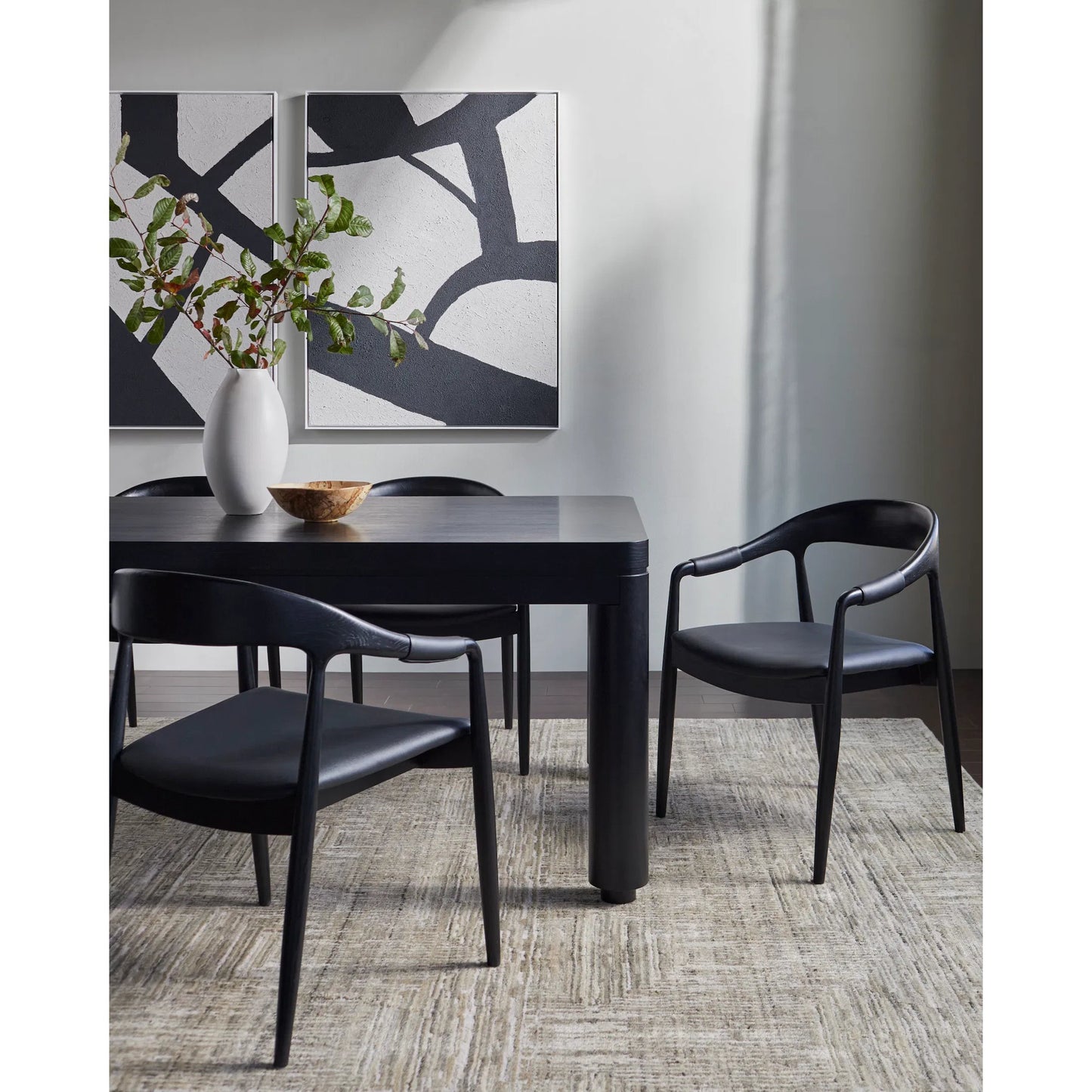 004 SI-2164710 | Lifestyle | Kisco Dining Chair - 530624 by Surya in base: black and lacquered. Made from faux leather, oak, polyurethane foam, polyester, polyfill in a modern style.