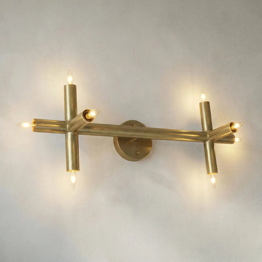 Salome Sconce by Noir in antique brass. Made from metal in a modern style.