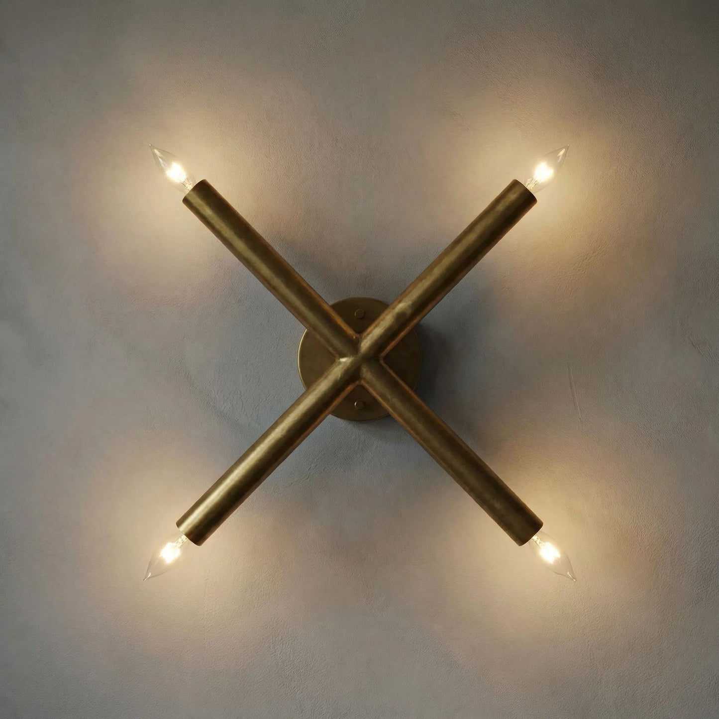 003 S-334607 | Lifestyle | Cross Sconce by Noir in antique brass. Made from metal in a modern style.