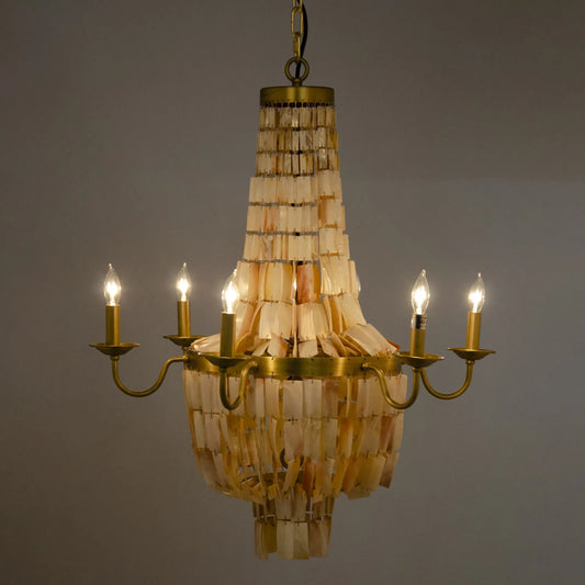 Bijou Chandelier by Noir in antique brass. Made from metal, shell in a traditional style.