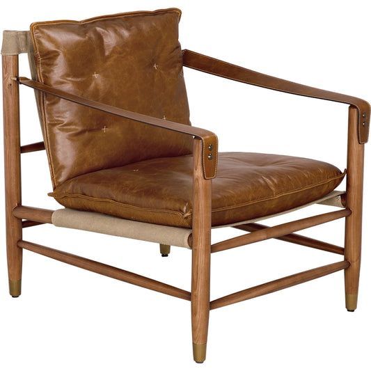 Luther Chair by Noir in cuba brown. Made from leather, brass, canvas fabric, dark walnut in a traditional style.