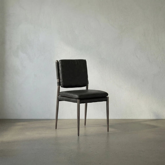 Elvis Chair by Noir in steel gray powder coat and ebony black. Made from industrial steel and top-grain leather in a modern style.