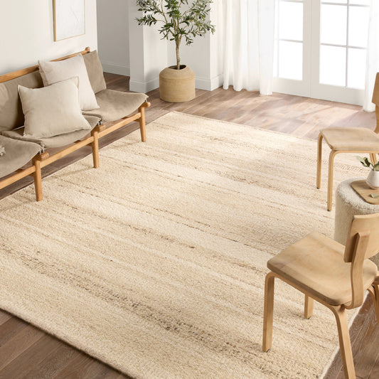 Leona LEO10 Rug by Jaipur Living in cream. Made from 100% wool in a unique style.